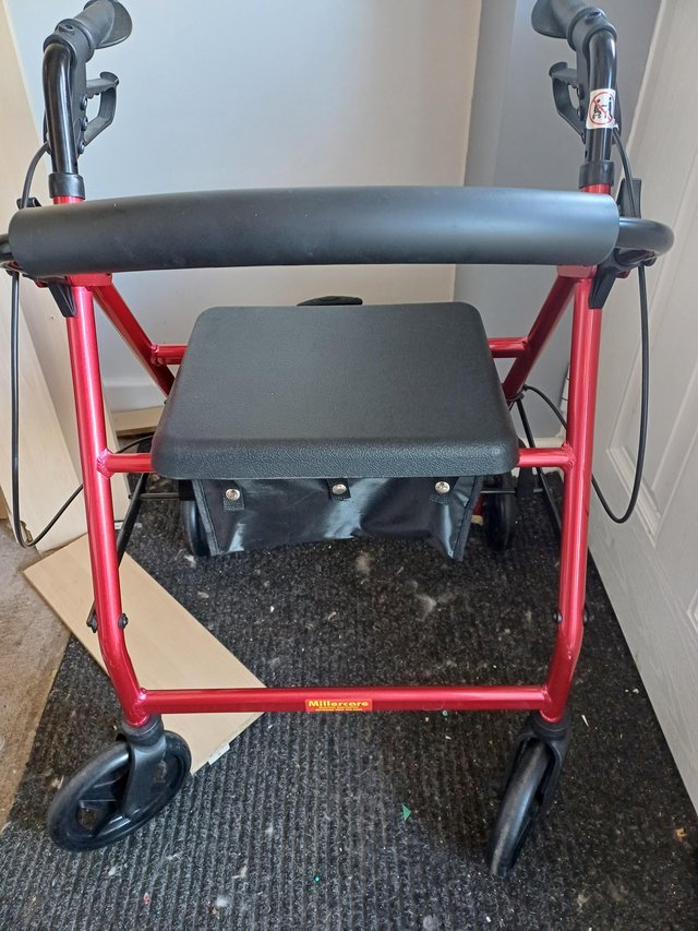 Preview of the first image of 4 wheeled Rollator with seat.