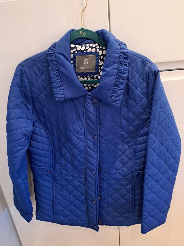Preview of the first image of Ladies blue jacket in blue size small.
