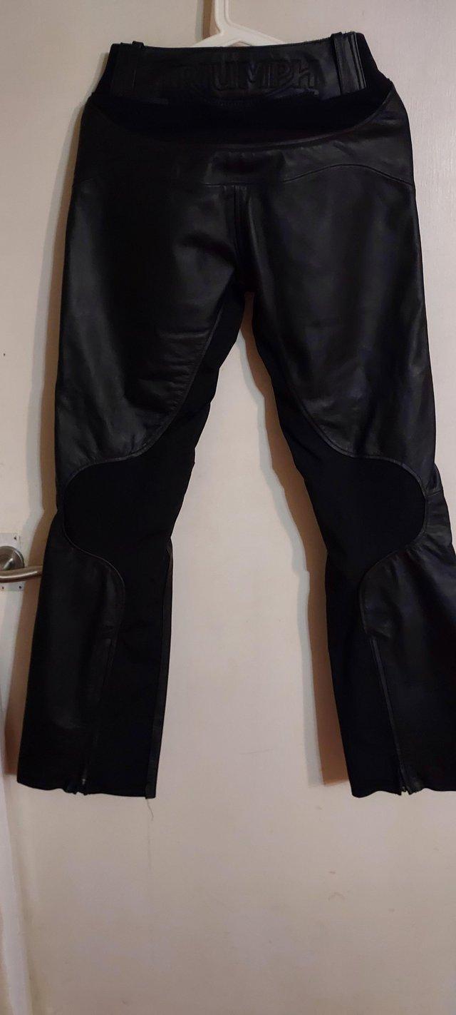 Preview of the first image of TRIUMPH LADIES MOTORCYCLE TROUSERS IN BLACK..