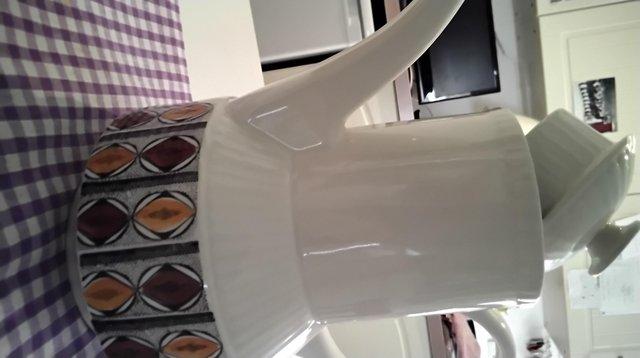 Preview of the first image of KATHIE WINKLE TEACPOT / coffee pot.