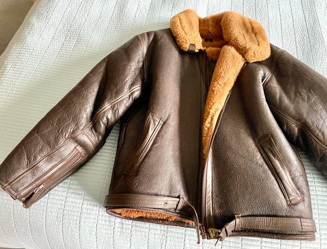 Preview of the first image of Sheepskin flying jacket & helmet.