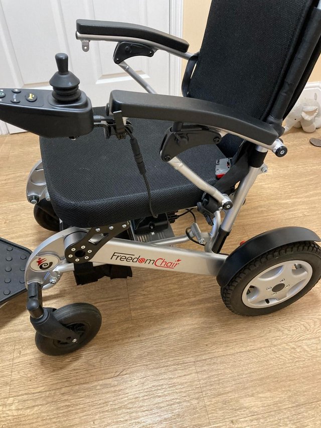 Preview of the first image of Freedom AO8L Folding lightweight Electric Wheelchair.