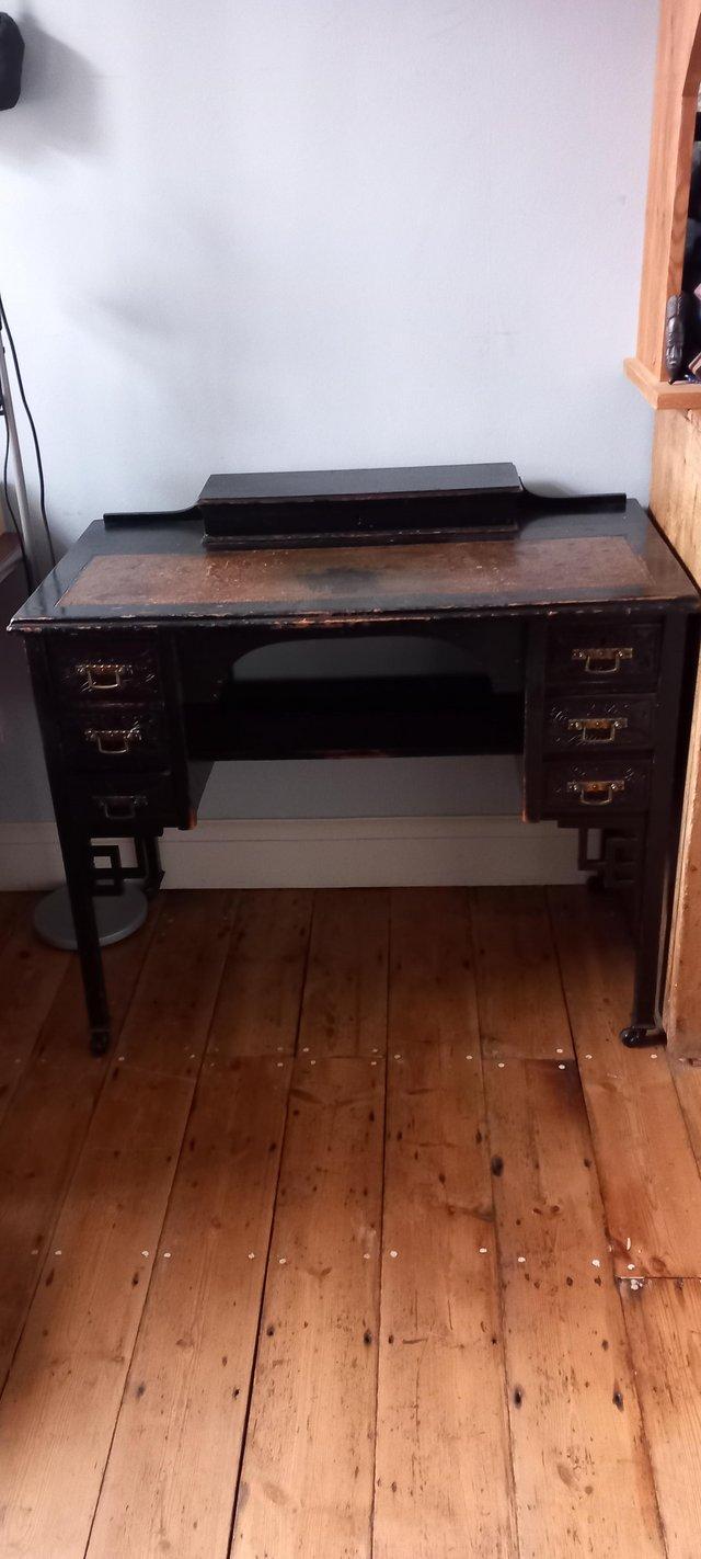 Preview of the first image of Very pretty ebonised lady's writing desk.