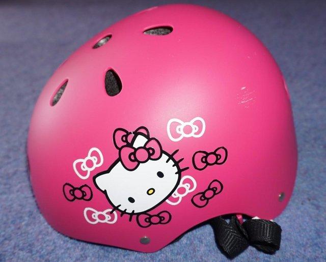 Preview of the first image of Hello Kity Childs cycle/ Skating helmet.