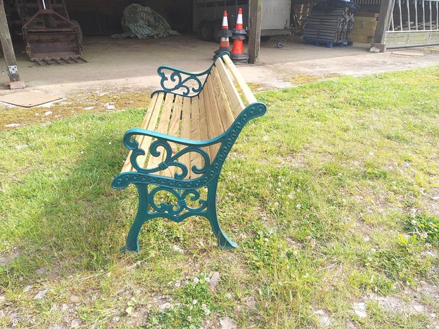 Preview of the first image of Garden Bench, cast iron ends and new timber.