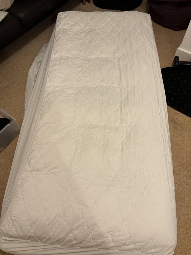 Preview of the first image of John Lewis washable mattress protector, single, £5, W3 8FG.