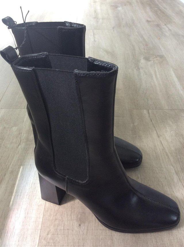 Preview of the first image of Black ankle boots new without tags, size 6.