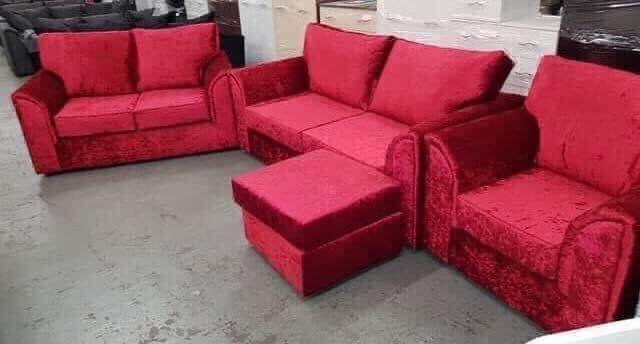 Preview of the first image of Omega fixed back red CV 3&2 with armchair and footstool.