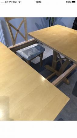 Image 1 of Extendable dining table and 6 chairs