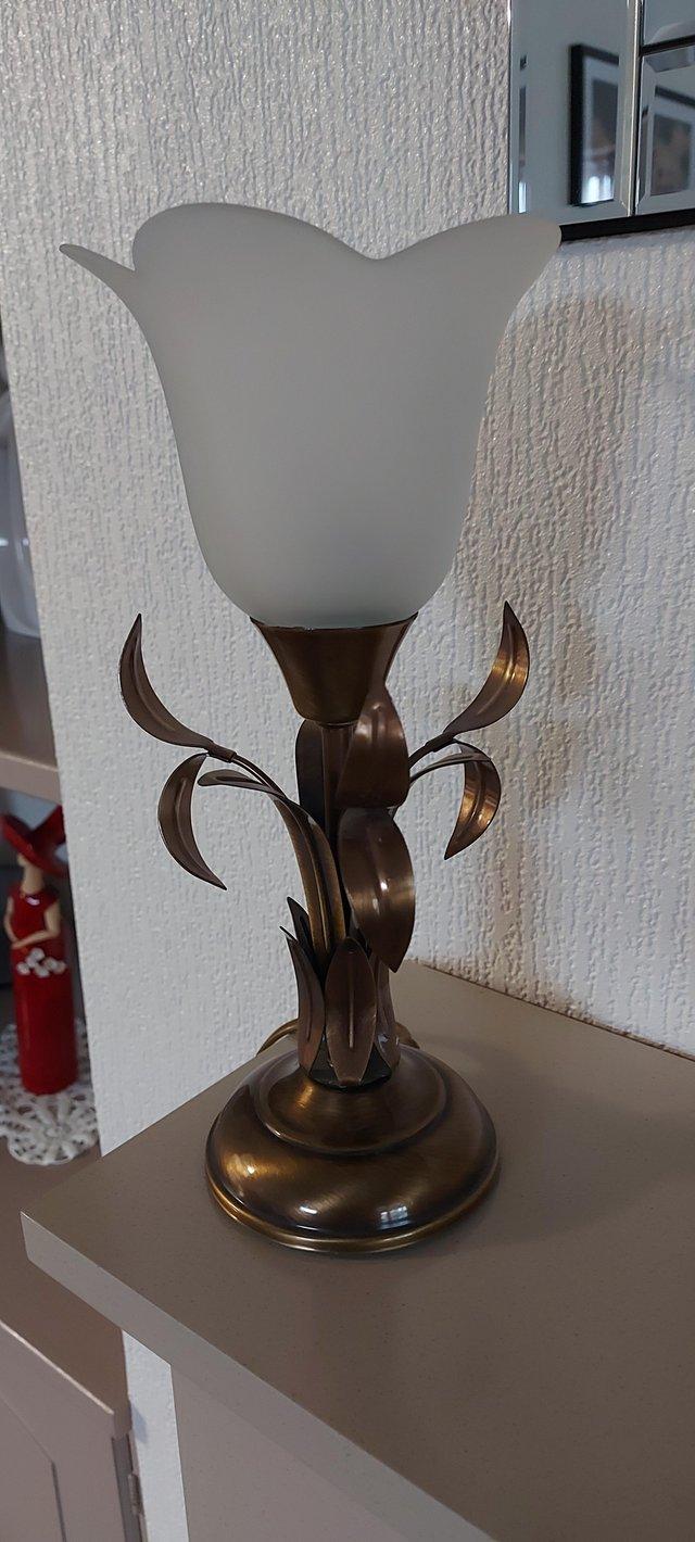 Preview of the first image of Small ornate brass effect table lamp..