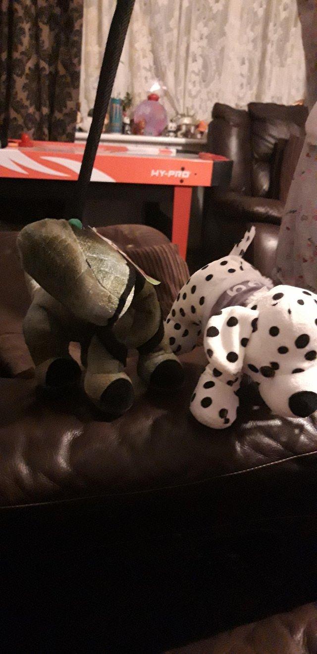 Preview of the first image of Dinosaur And Dalmatian dog on lead good condition.