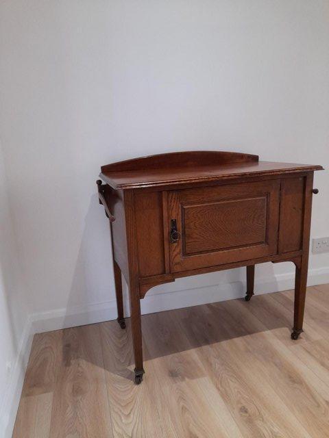 Preview of the first image of Edwardian oak washstand / cupboard.