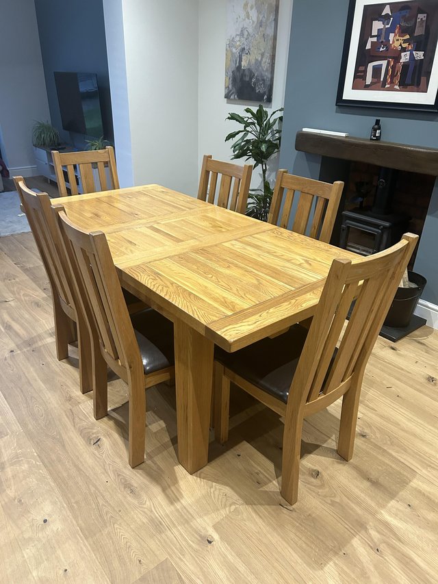 Preview of the first image of Solid oak dining table and 6 chairs.