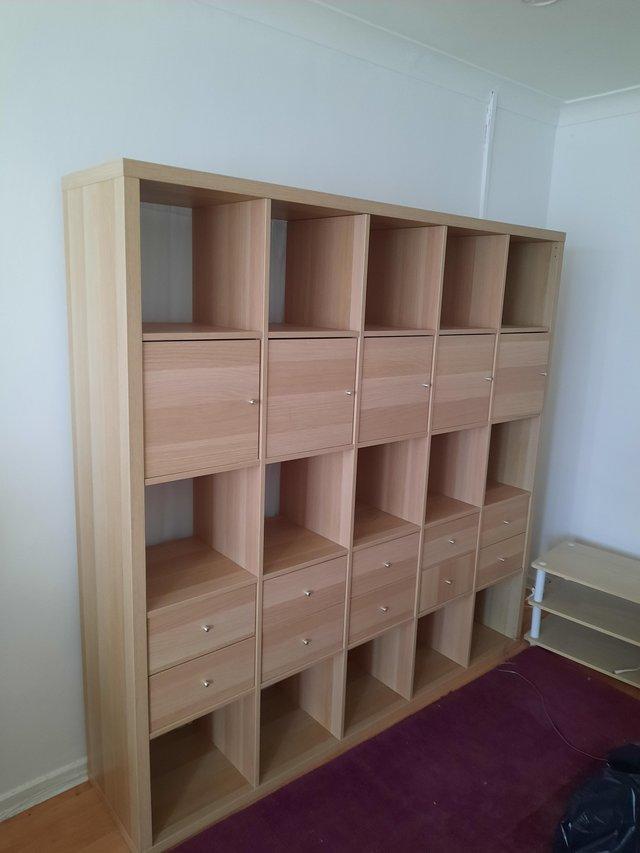 Preview of the first image of Large space saving oak looking wall unit.