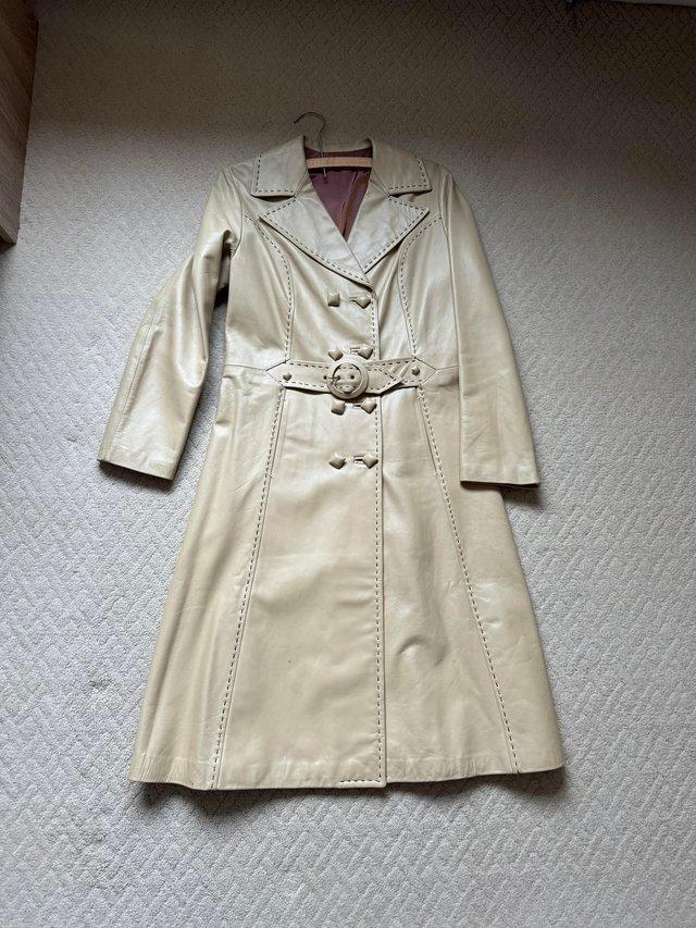 Preview of the first image of Leather coat. Full length size 10-12.