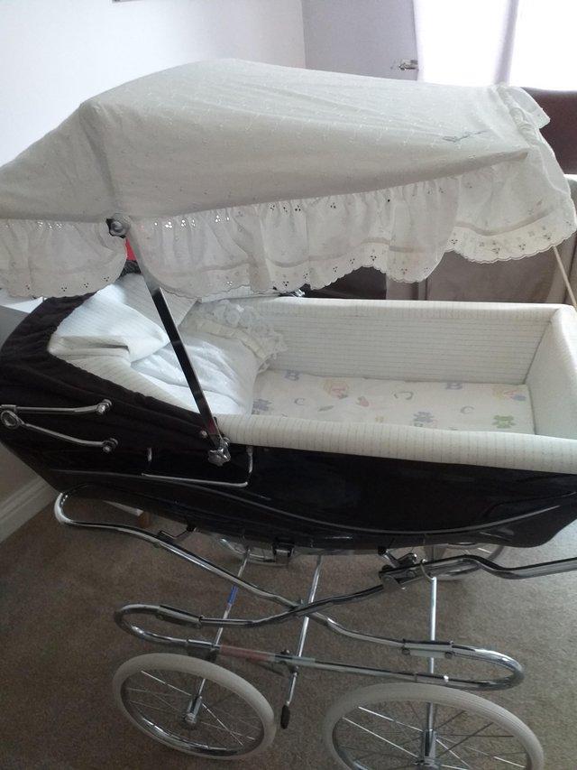 Preview of the first image of Silvercross coachbuilt pram canopy.