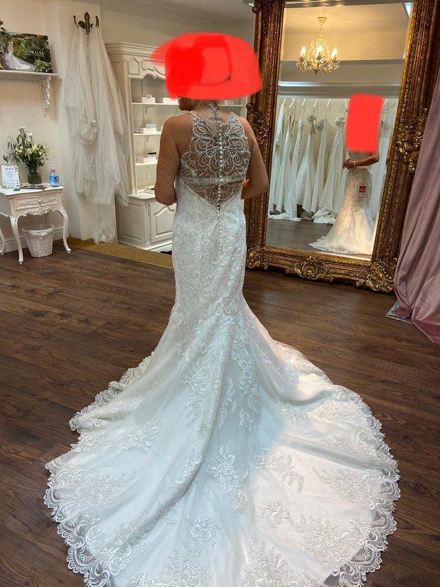 Preview of the first image of Brand new wedding dress. Never been worn..