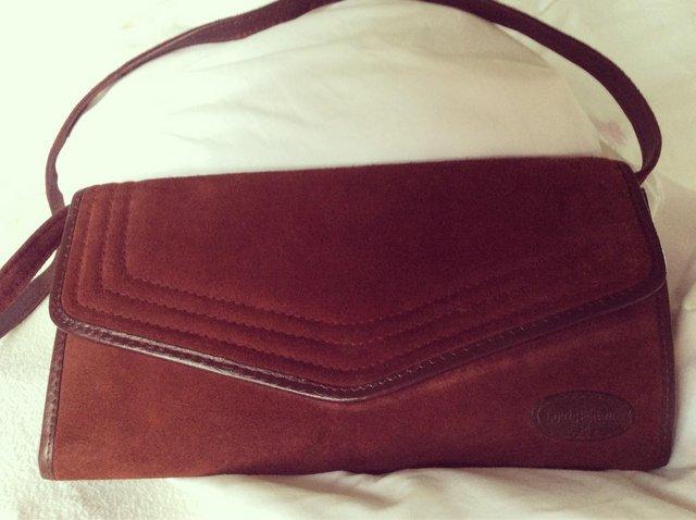 Preview of the first image of Vintage Handbag in wine coloured suede.