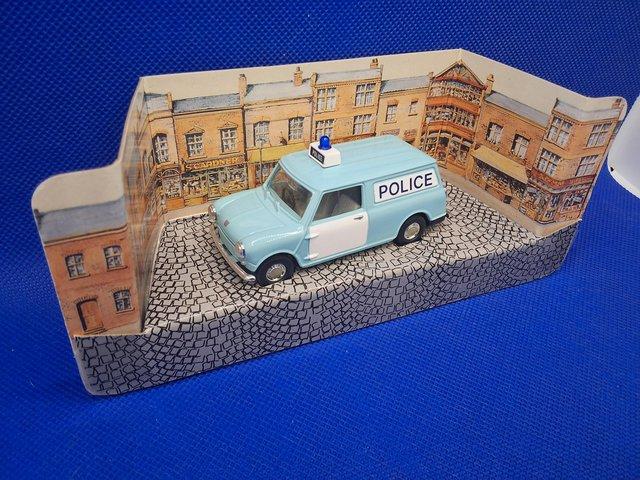 Preview of the first image of Corgi morris police mini van.