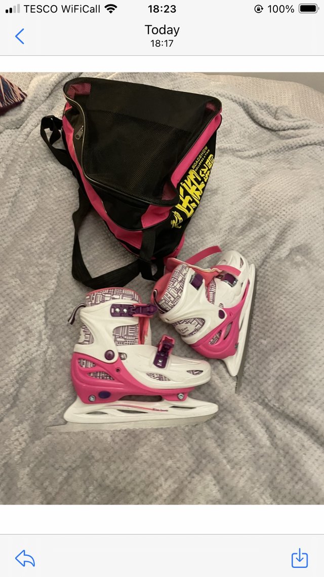 Preview of the first image of Girls ice skating boots with guards and bag .worn twice.