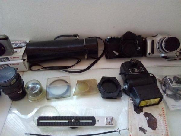 Image 1 of Two Cameras and various lenses.