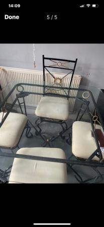 Image 2 of Cast iron table an chairs