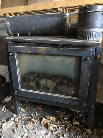 Image 2 of 2 old log burning stoves