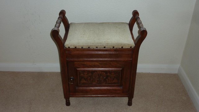 Preview of the first image of Vintage Wooden Piano Stool with Cushioned Seat & Storage.