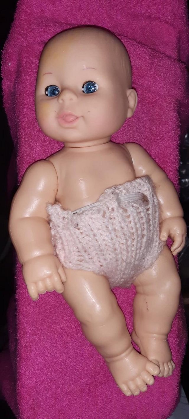 Preview of the first image of Small baby doll - Measures 25cm / 10 inches approx in length.