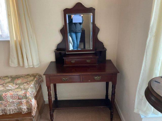Preview of the first image of Upcycling project? Dark wood dressing table.