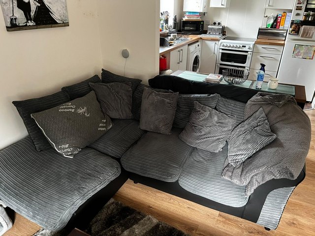 Preview of the first image of Corner sofa black/grey  in good condition.