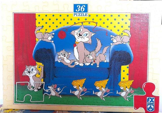 Preview of the first image of CHILD's PUZZLE - KATJA and MORITZ - CATS AT PLAY.