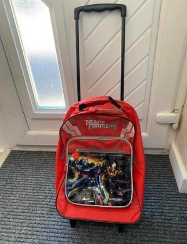 Preview of the first image of Transformer and Backpack with wheels H46 W27 D16 cm.