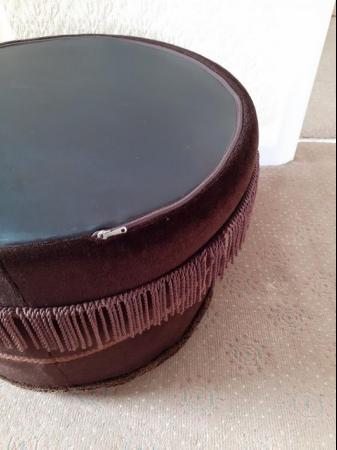 Image 2 of A Brown velour covered pouffe.