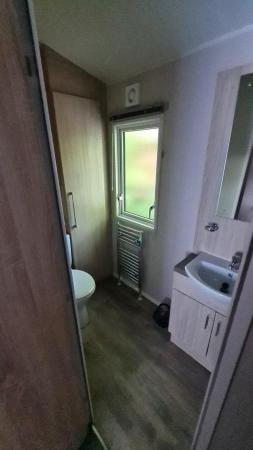 Image 16 of Charming 3-Bedroom Caravan for sale at White Cross Bay Holid