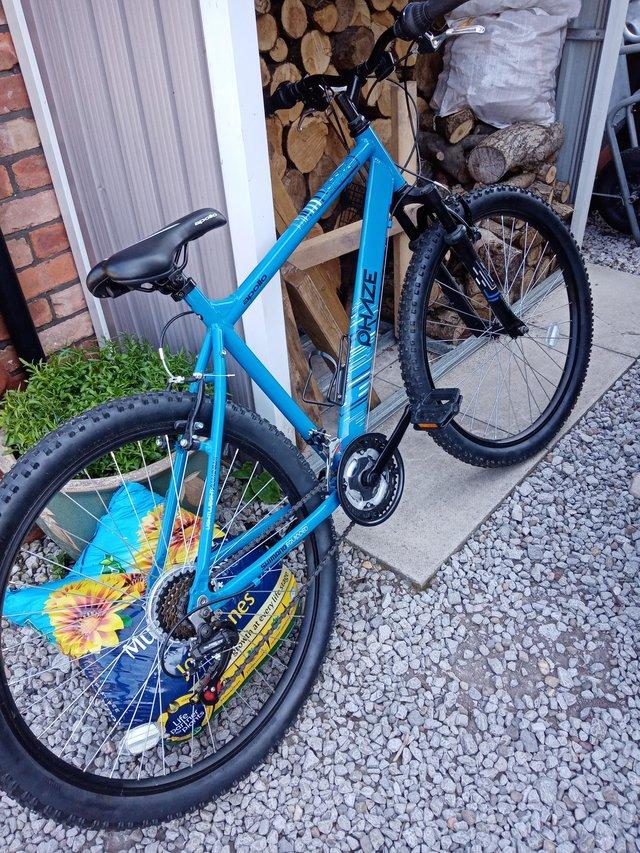 Preview of the first image of Man's mountain bike bought but never been used..