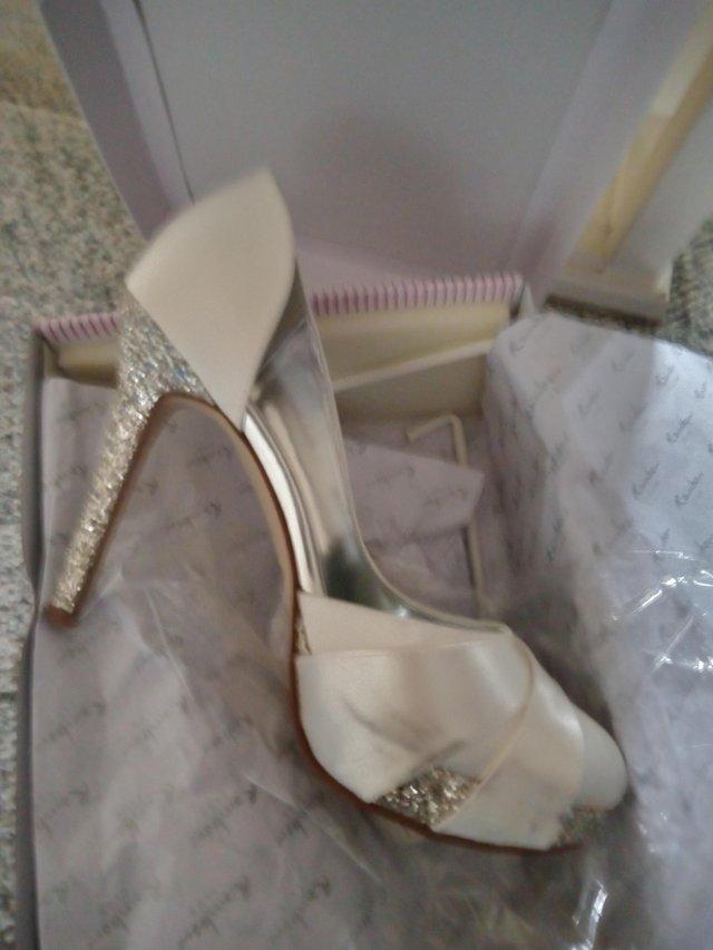 Preview of the first image of Wedding shoes design shoes rainbow.