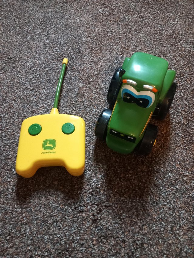 Preview of the first image of Tomy john deere remote tractor.