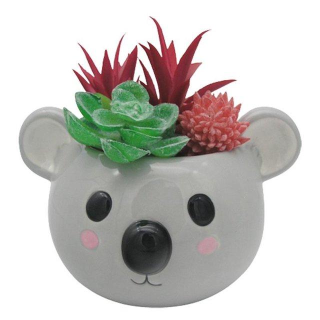 Preview of the first image of Koala Head Shaped Ceramic Garden Planter/Plant Pot.Free post.