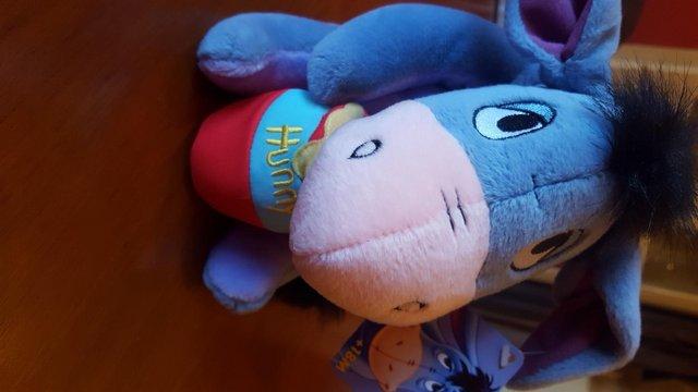 Preview of the first image of Disney Fisher Price Eeyore With Hunny Pot 2004.