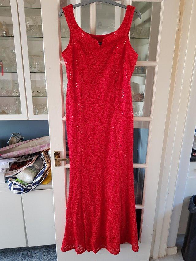Preview of the first image of Quiz red lace and sequinned dress Size 18.