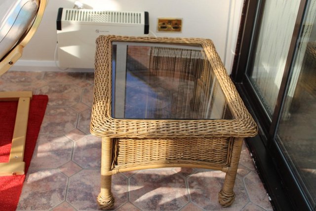 Preview of the first image of Wicker Coffee Table with Glass Top.