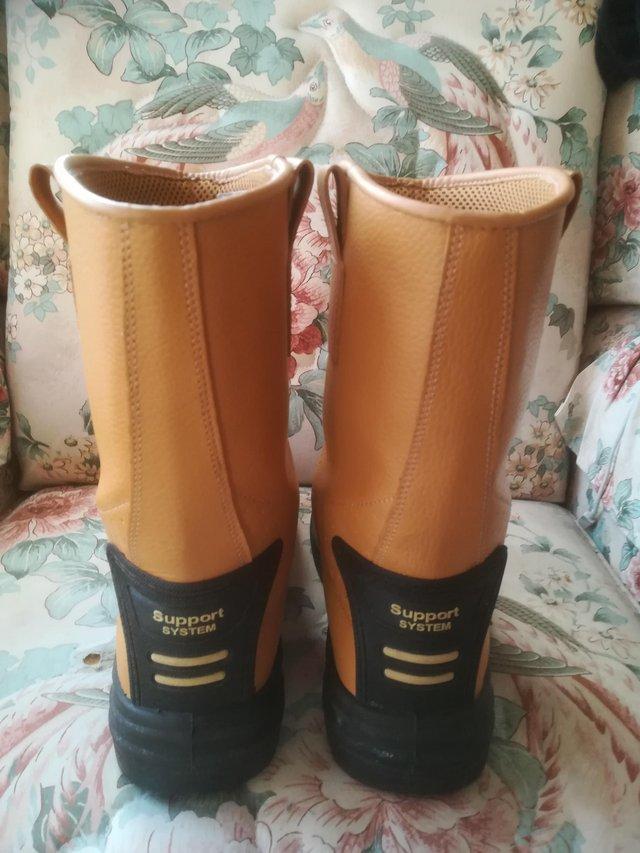 Preview of the first image of Mens size 10  all leather tan wellingtons.