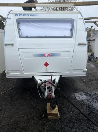 Image 3 of Adria Adora 612 UP fixed bed single axel. 1 owner from now!
