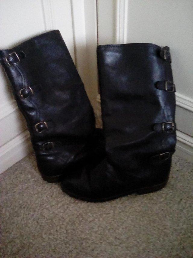 Preview of the first image of Ladies Black leather winter boots.