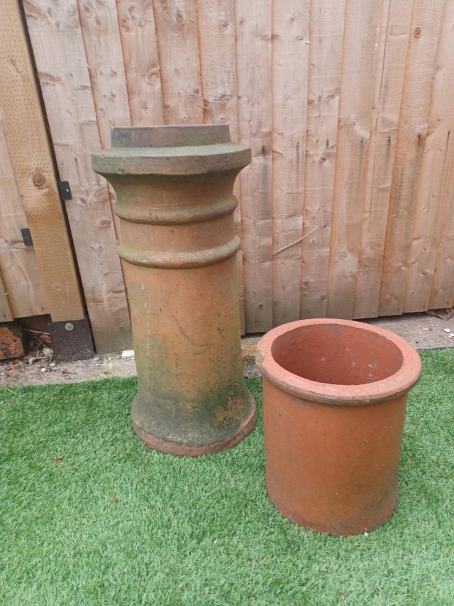 Preview of the first image of 2 chimney pots, one large, one small.
