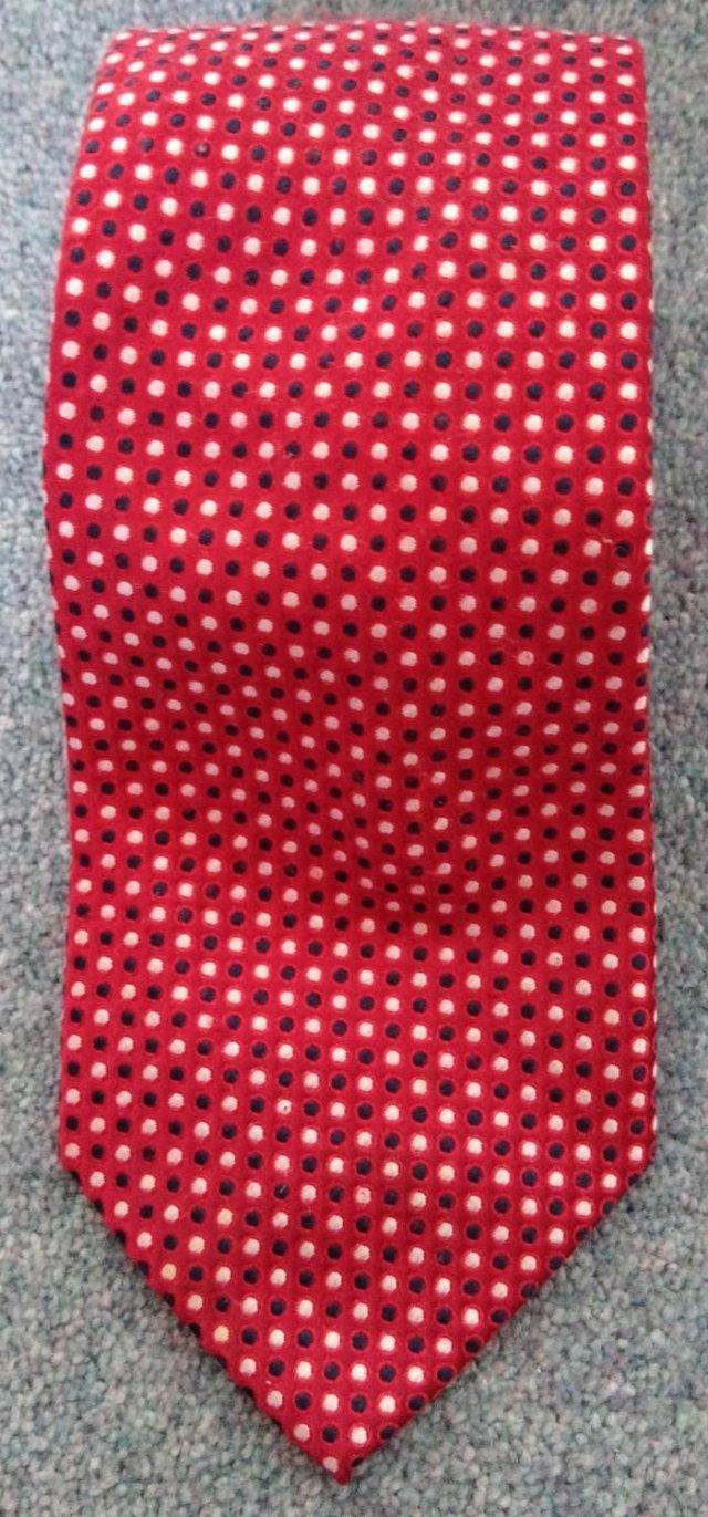 Preview of the first image of Marks and Spencer red polka dot pattern tie.
