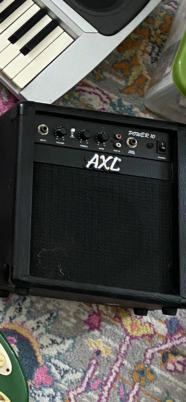 Preview of the first image of Black guitar and amp for sale.