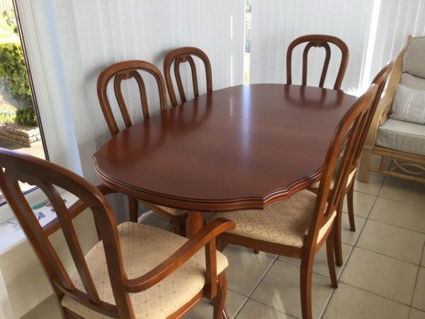 Image 2 of Oval Extendable Dining Room Table