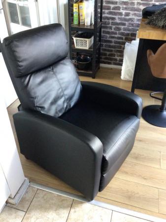 Image 2 of Black recliner armchair for sale.